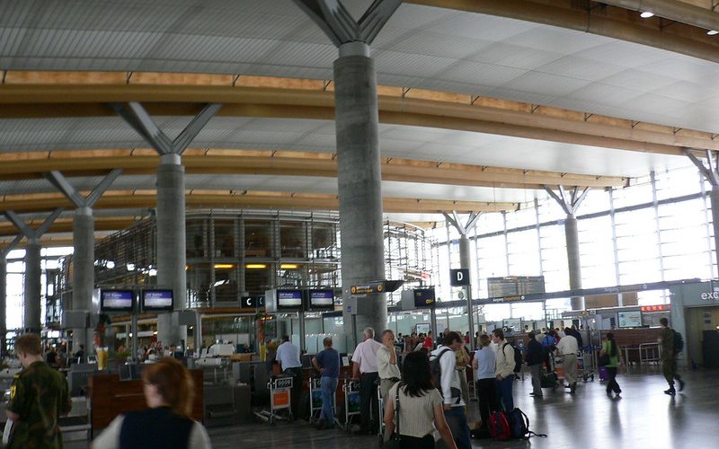 Passengers with their luggage at Oslo Airport Norway