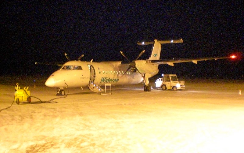 Plane being prepared for take off at Tromso Airport