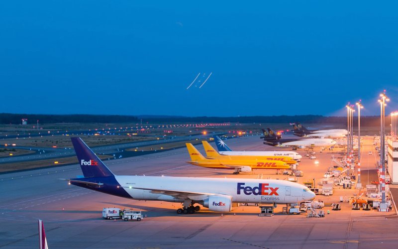 Aeroplan standing under night sky at Cologne Bonn Airport