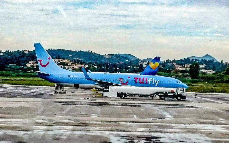 A blue color plane standing at Corfu Airport.