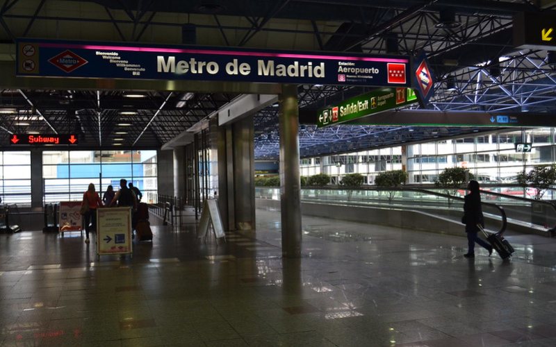 Passengers with their luggage at Metro De Madrid