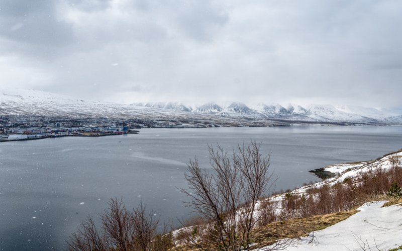 Water bodies covered with ice all around in Akureyri.