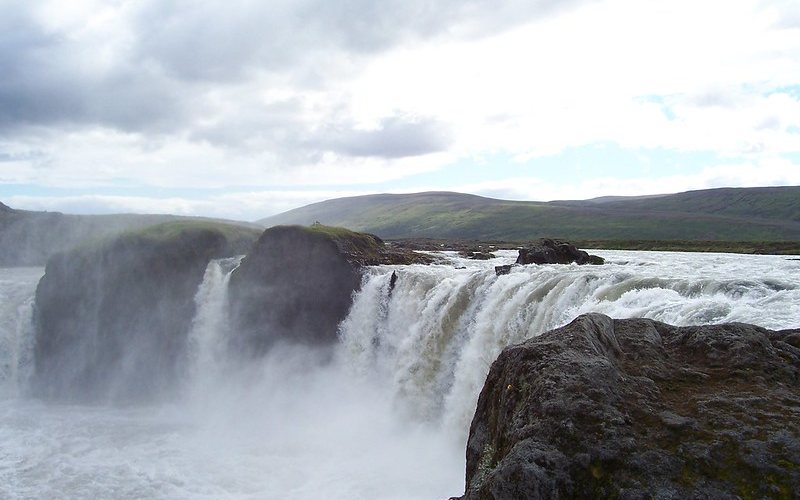 Amazing majestic waterfalls under clear sky in Iceland.