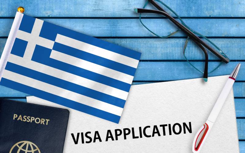 Visa application form and flag of Greece