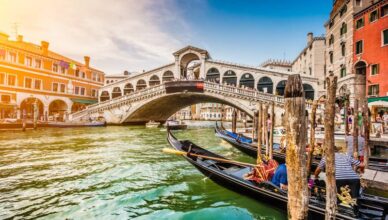 Panoramic view of famous Canal in Italy under sunset.