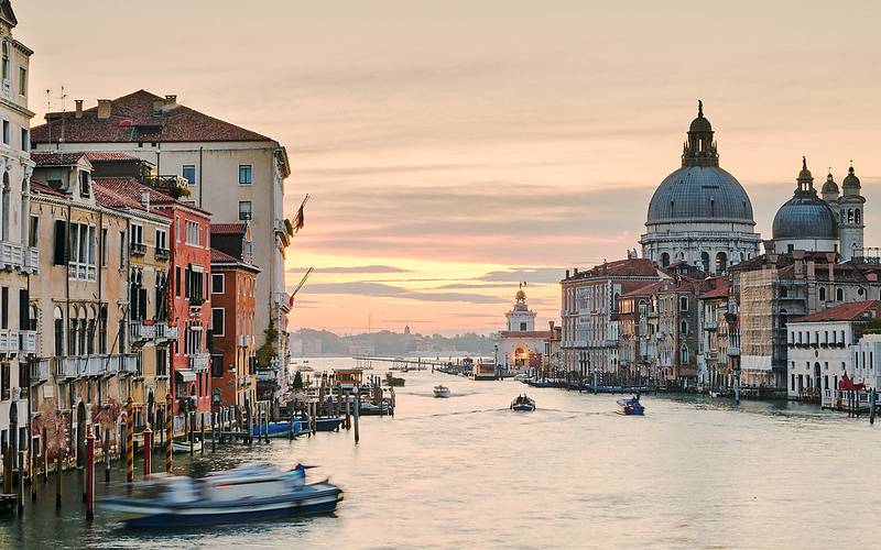 Panoramic view of venice city with beautiful sunset and canals