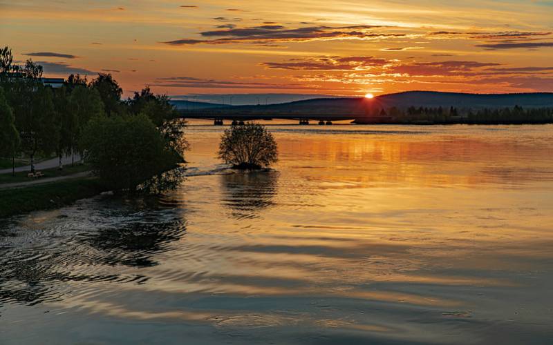 View of beautiful midnight sun in Lapland