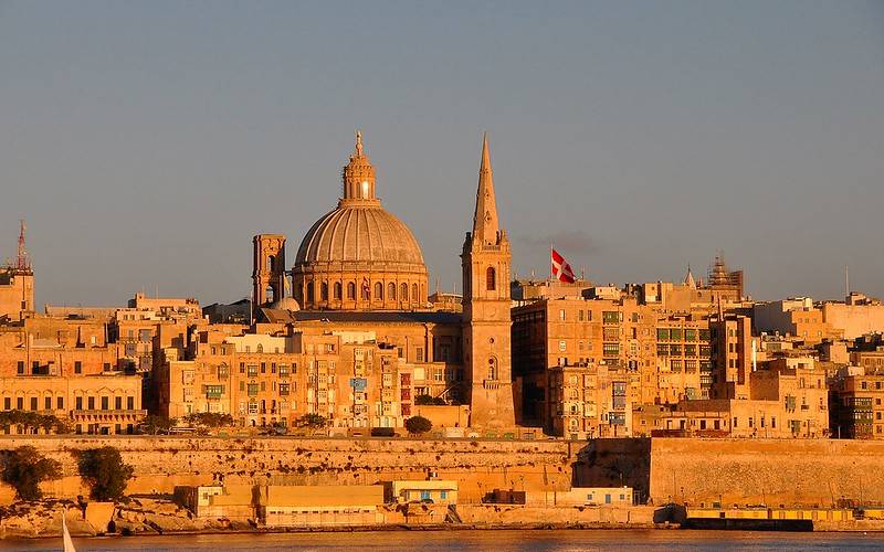 Huge concrete building under the sky in Valletta.